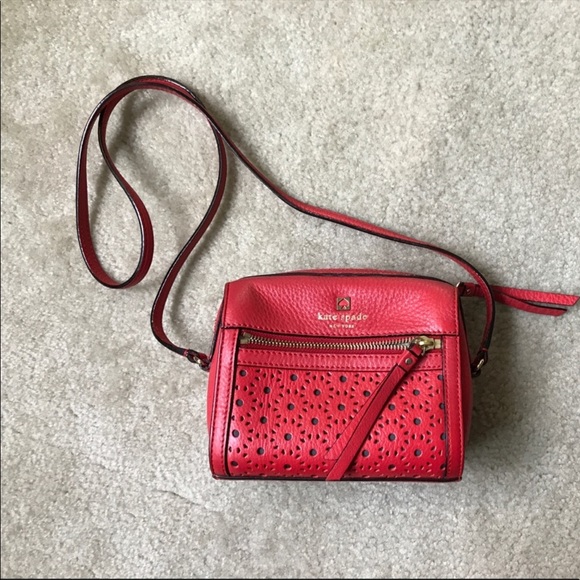 Ruby red Kate spade bag.